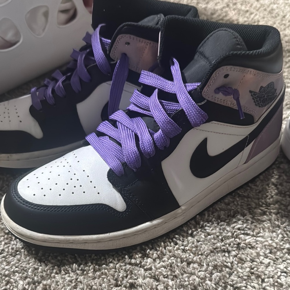 Nike Black and White Athletic Shoes with High-Top Design